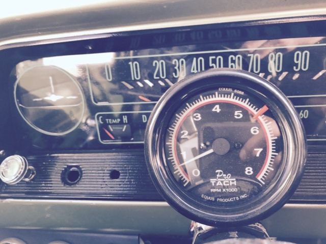 Black 1964 Chevrolet C-10 Small Back Window with Yenko Green interior