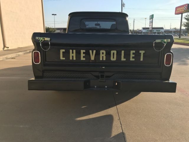 Black 1964 Chevrolet C-10 Small Back Window with Yenko Green interior