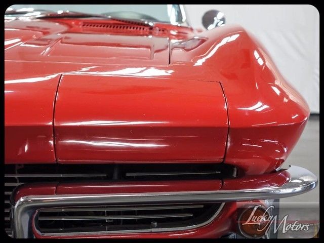 Red 1964 Chevrolet Corvette Convertible with Black interior