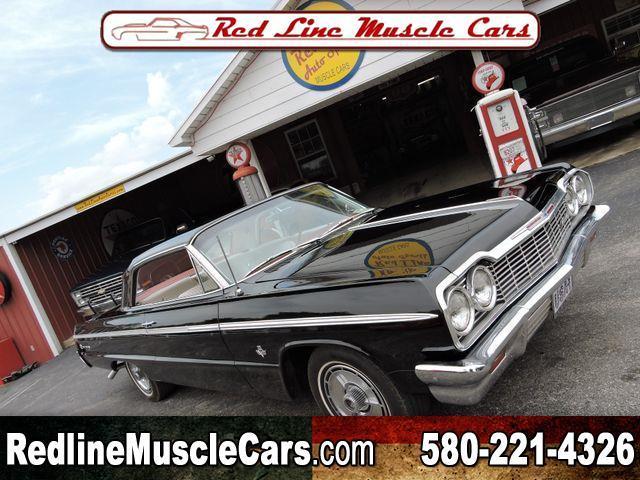 Black 1964 Chevrolet SS with White interior