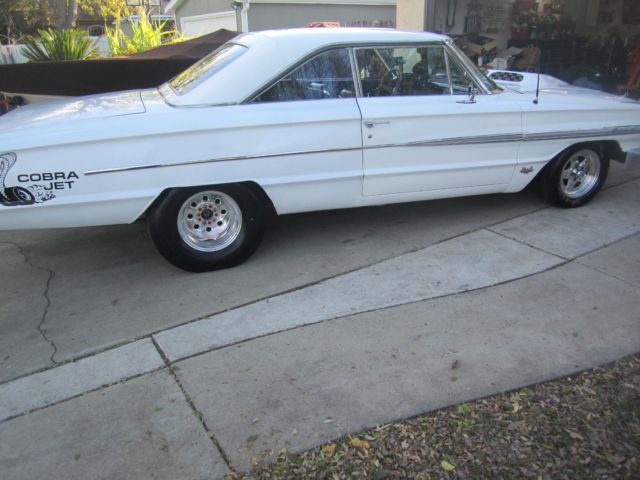 White 1964 Ford Galaxie with Black interior
