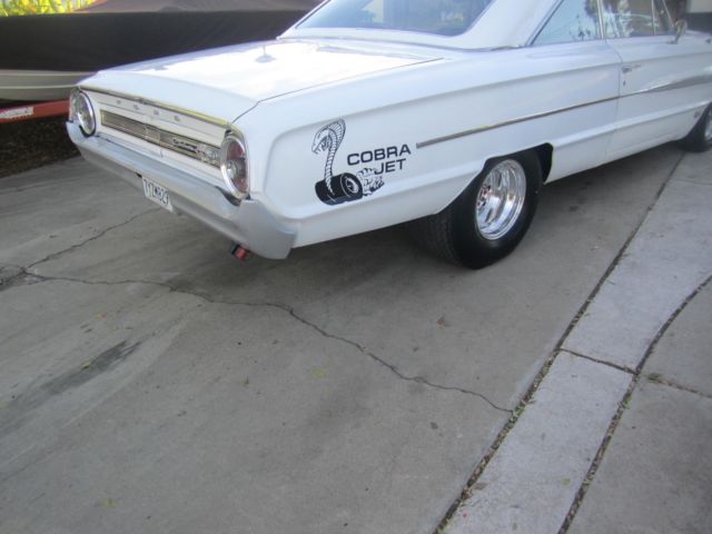 White 1964 Ford Galaxie with Black interior