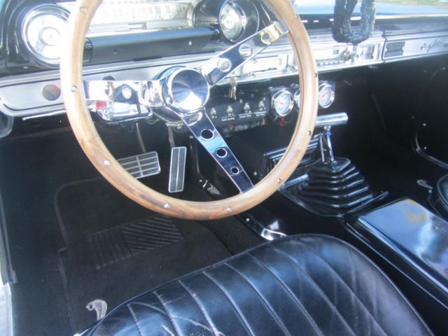 White 1964 Ford Galaxie with Black interior