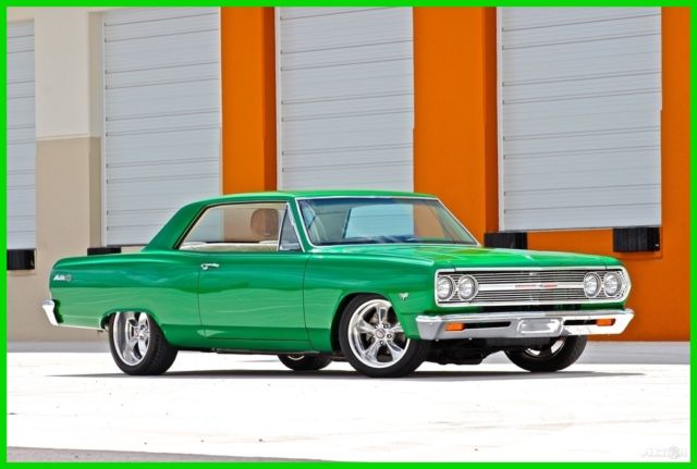 Green 1965 Chevrolet Malibu Coupe with White interior