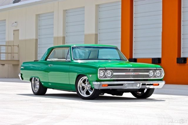Green 1965 Chevrolet Malibu Coupe with White interior
