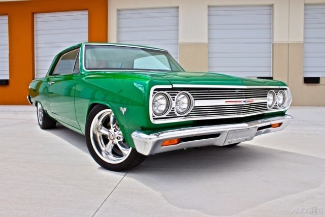 Green 1965 Chevrolet Malibu Coupe with White interior