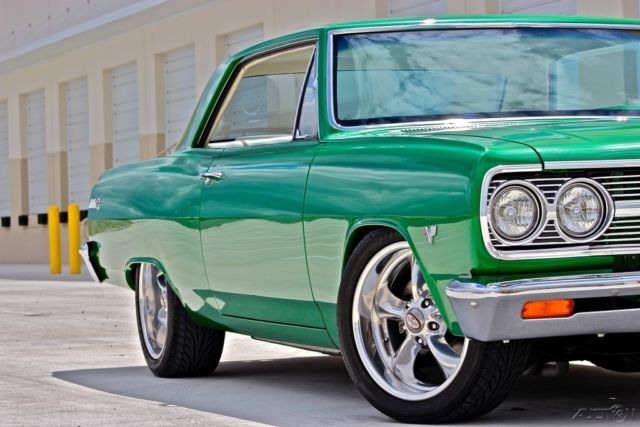Green 1965 Chevrolet Malibu Coupe with White interior