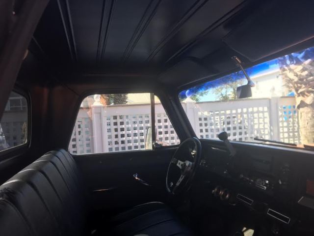 Orange/Black 1965 Chevrolet C-10 with Black interior