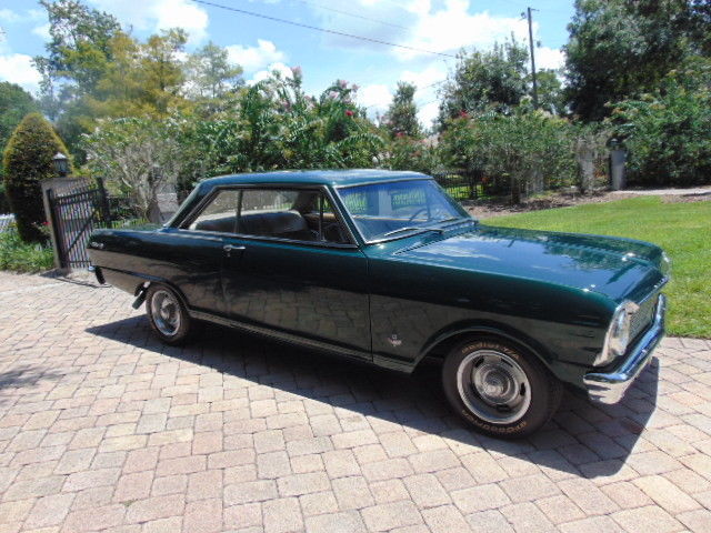 Green 1965 Chevrolet Nova Coupe with Tan interior
