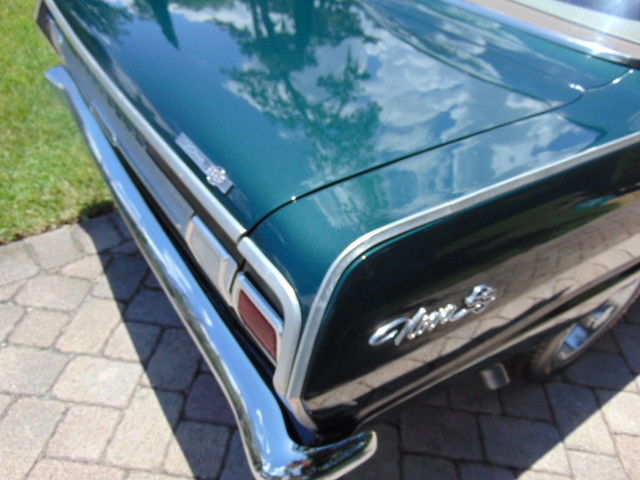 Green 1965 Chevrolet Nova Coupe with Tan interior