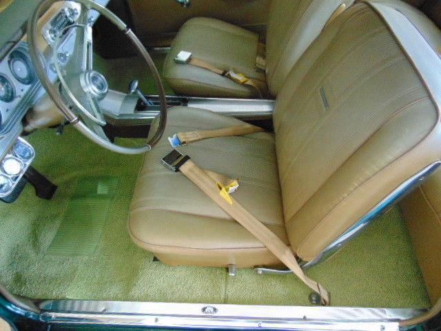 Green 1965 Chevrolet Nova Coupe with Tan interior