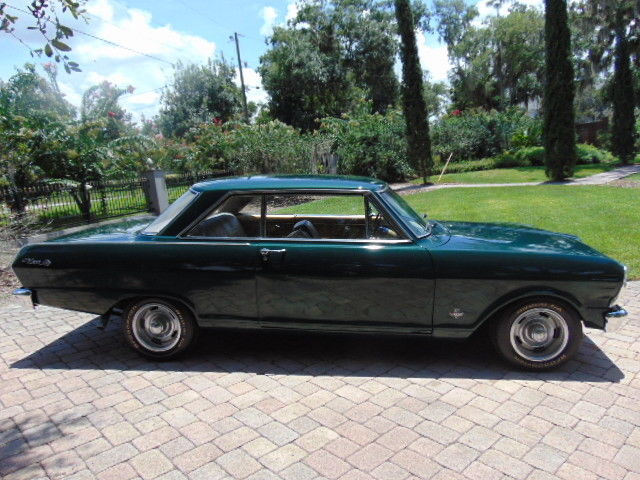 Green 1965 Chevrolet Nova Coupe with Tan interior