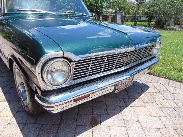 Green 1965 Chevrolet Nova Coupe with Tan interior