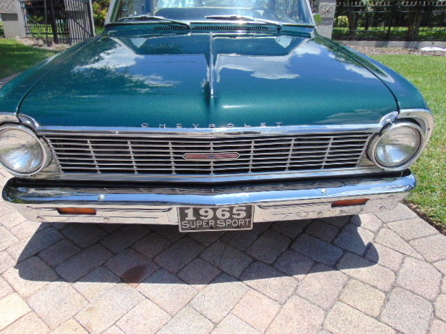 Green 1965 Chevrolet Nova Coupe with Tan interior