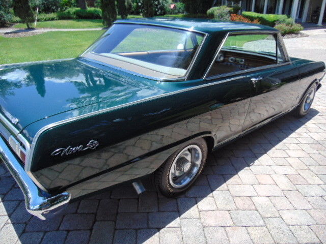 Green 1965 Chevrolet Nova Coupe with Tan interior