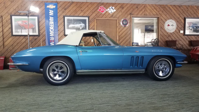 Blue 1965 Chevrolet Corvette with White interior