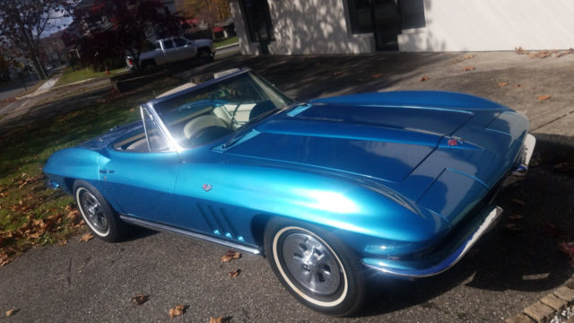 Blue 1965 Chevrolet Corvette with White interior