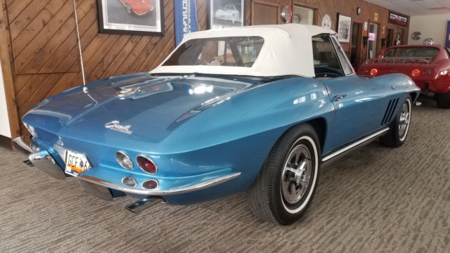 Blue 1965 Chevrolet Corvette with White interior