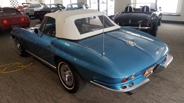 Blue 1965 Chevrolet Corvette with White interior