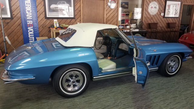 Blue 1965 Chevrolet Corvette with White interior