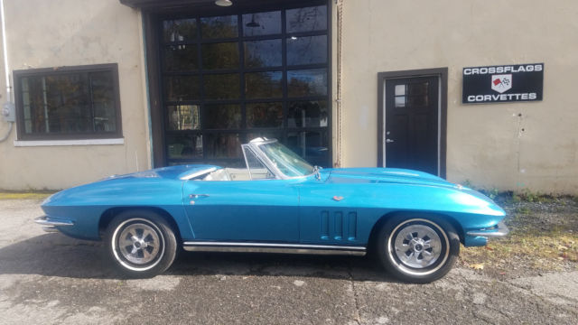 Blue 1965 Chevrolet Corvette with White interior