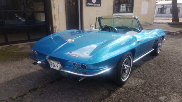 Blue 1965 Chevrolet Corvette with White interior