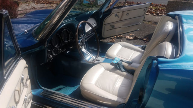 Blue 1965 Chevrolet Corvette with White interior