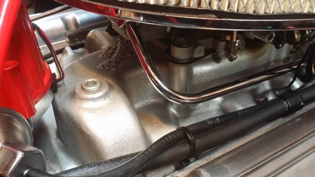 Red 1965 Chevrolet Corvette Convertible with Black interior