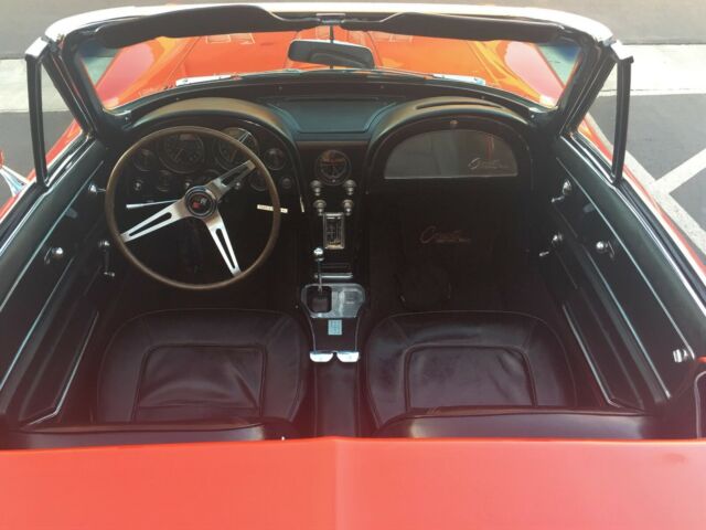 Red 1965 Chevrolet Corvette Convertible with Black interior