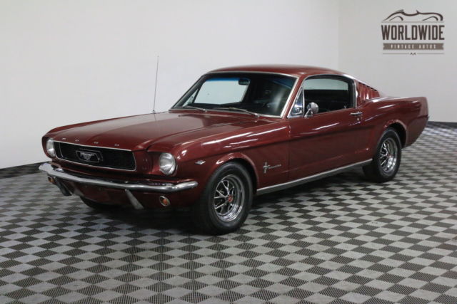 Red 1965 Ford Mustang with Black interior