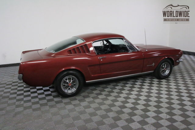 Red 1965 Ford Mustang with Black interior