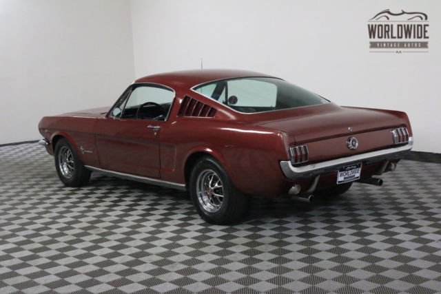 Red 1965 Ford Mustang with Black interior