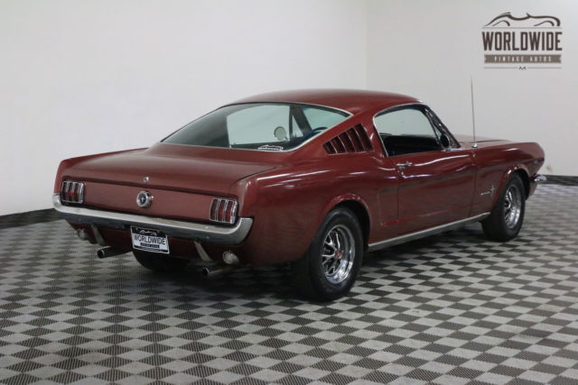 Red 1965 Ford Mustang with Black interior