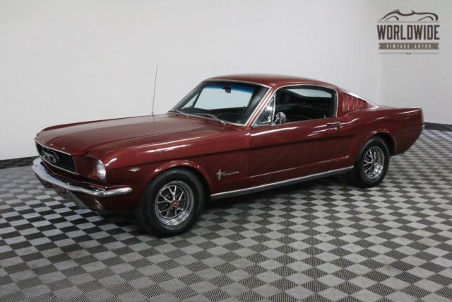 Red 1965 Ford Mustang with Black interior