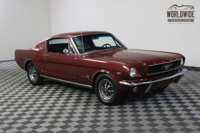 Red 1965 Ford Mustang with Black interior