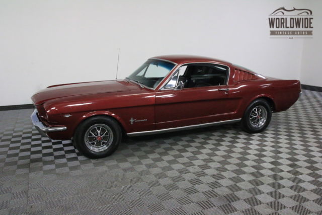 Red 1965 Ford Mustang with Black interior