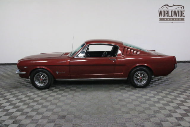 Red 1965 Ford Mustang with Black interior