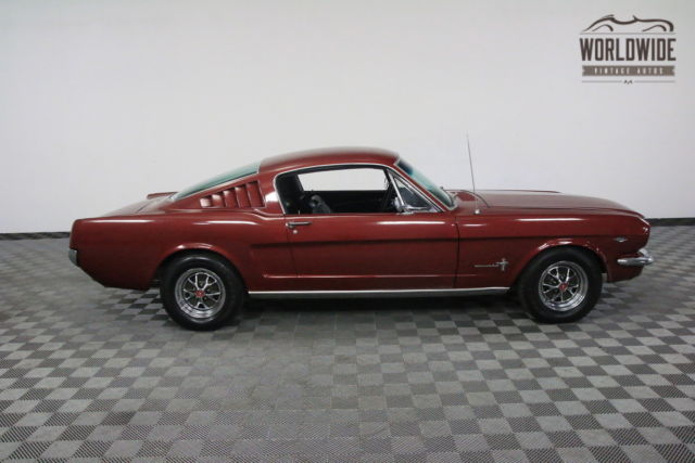 Red 1965 Ford Mustang with Black interior