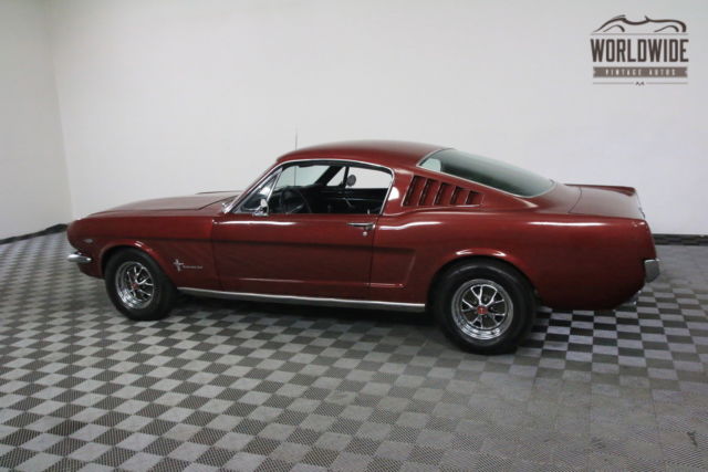 Red 1965 Ford Mustang with Black interior
