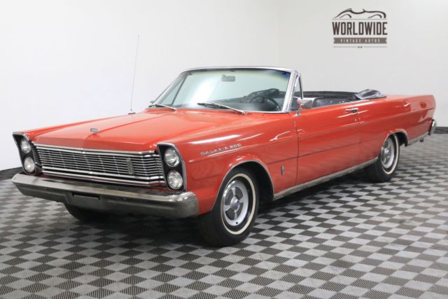 Red 1965 Ford Galaxie with Black interior