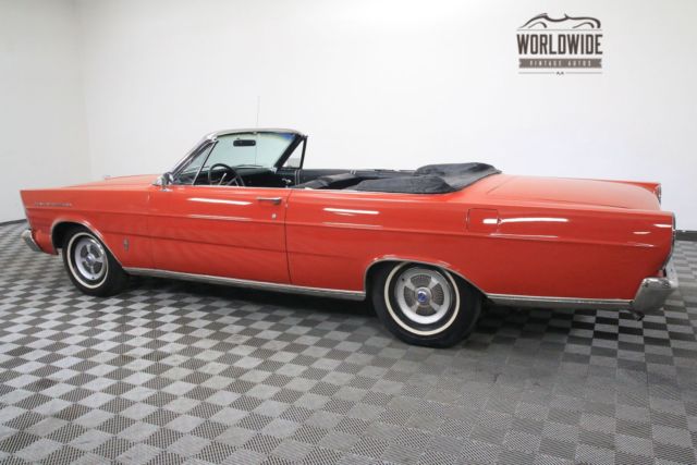 Red 1965 Ford Galaxie with Black interior