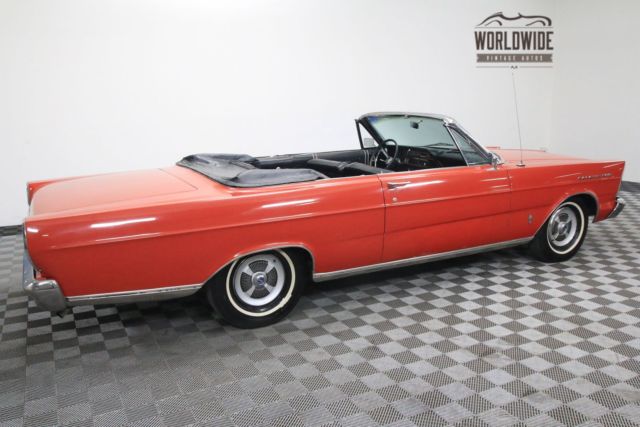 Red 1965 Ford Galaxie with Black interior