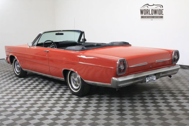 Red 1965 Ford Galaxie with Black interior