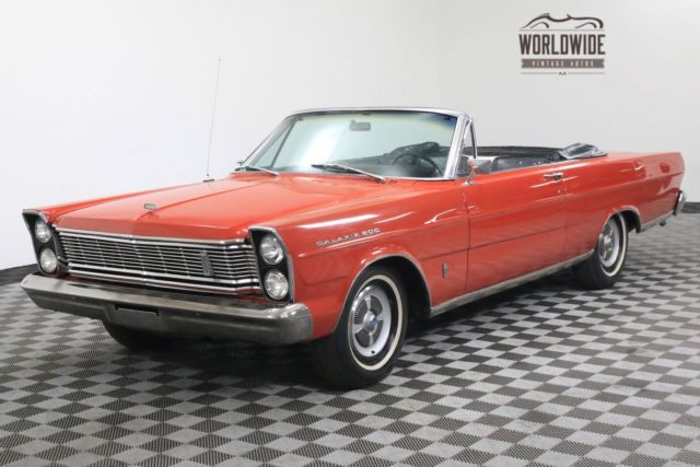 Red 1965 Ford Galaxie with Black interior