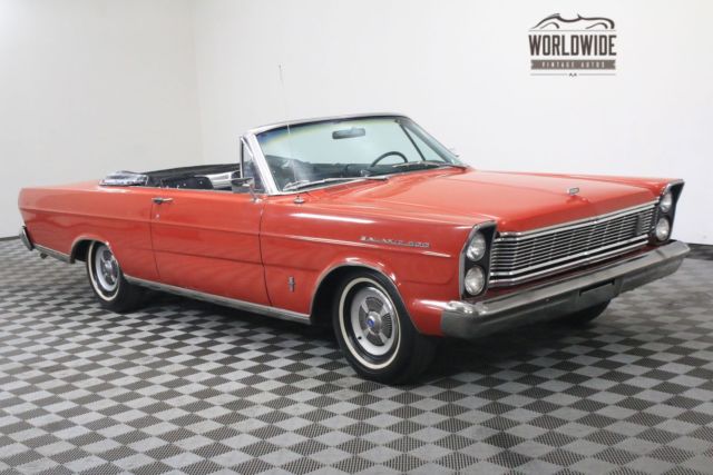 Red 1965 Ford Galaxie with Black interior