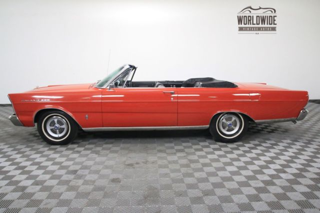 Red 1965 Ford Galaxie with Black interior
