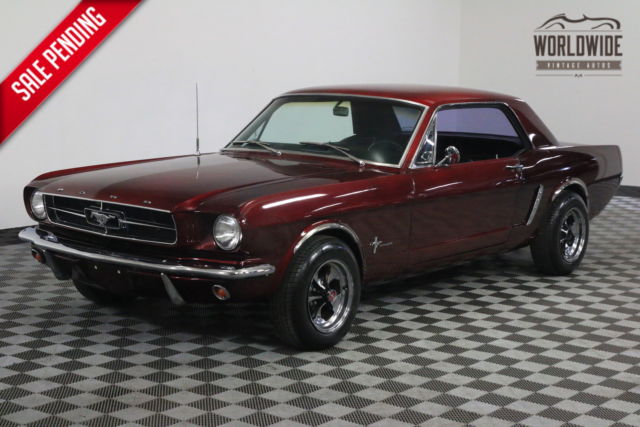 Red 1965 Ford Mustang with Black interior