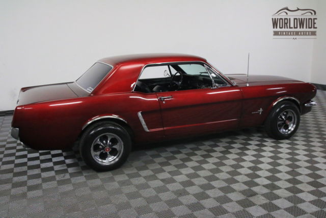 Red 1965 Ford Mustang with Black interior