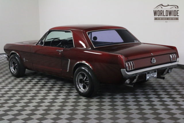 Red 1965 Ford Mustang with Black interior