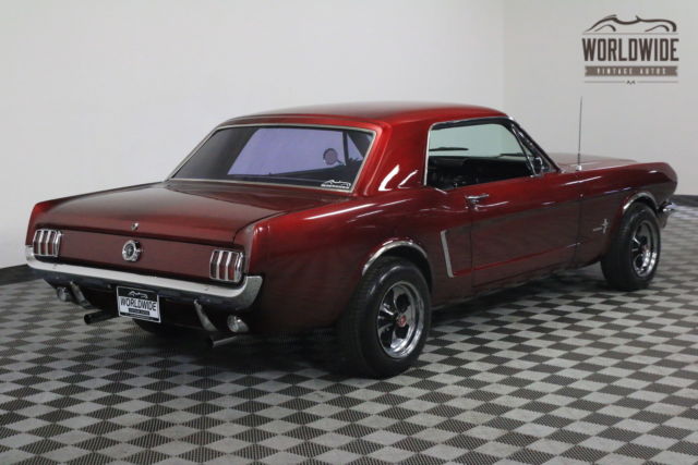 Red 1965 Ford Mustang with Black interior